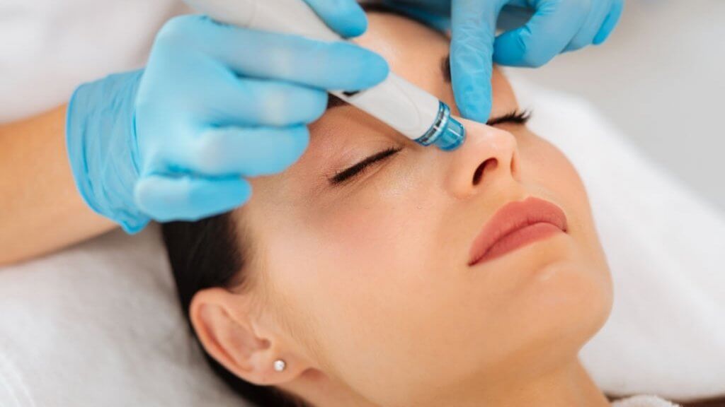 Face of a nice good looking woman during hydrafacial