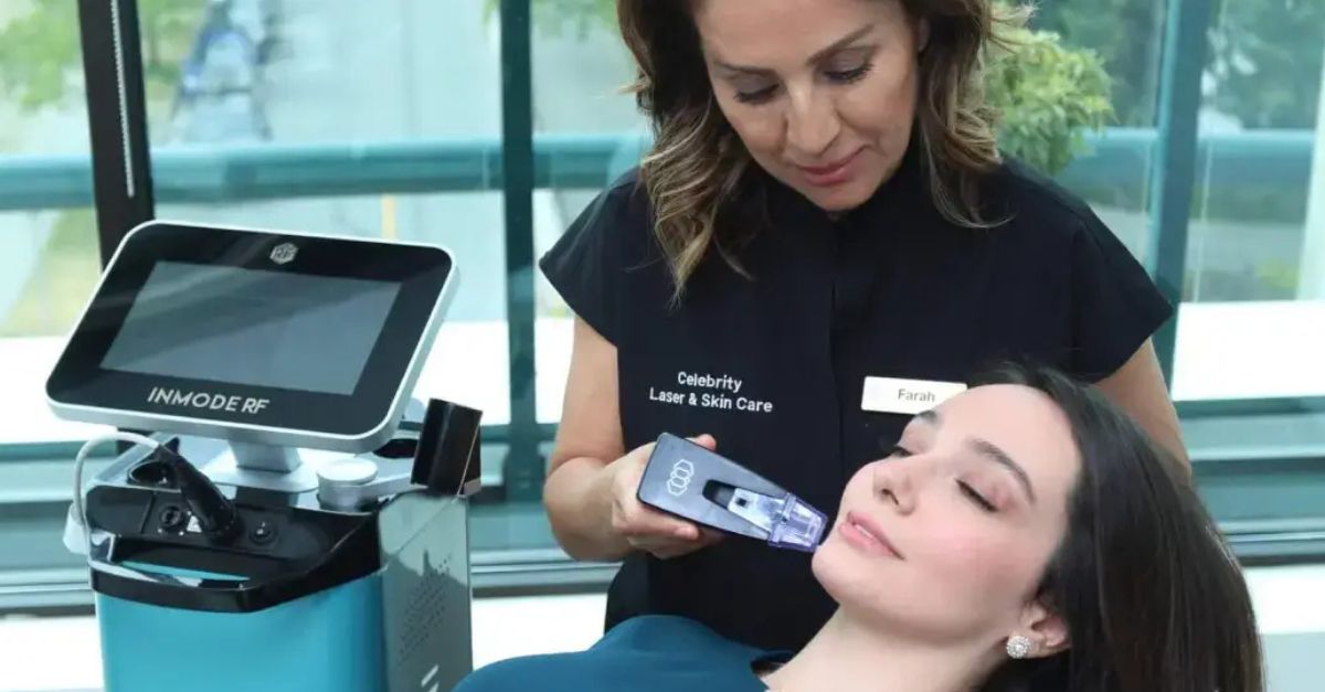 A skincare specialist uses an advanced Morpheus8 device to perform a facial procedure on a client, demonstrating the professional skin rejuvenating treatments at Celebrity Laser & Skin Care.