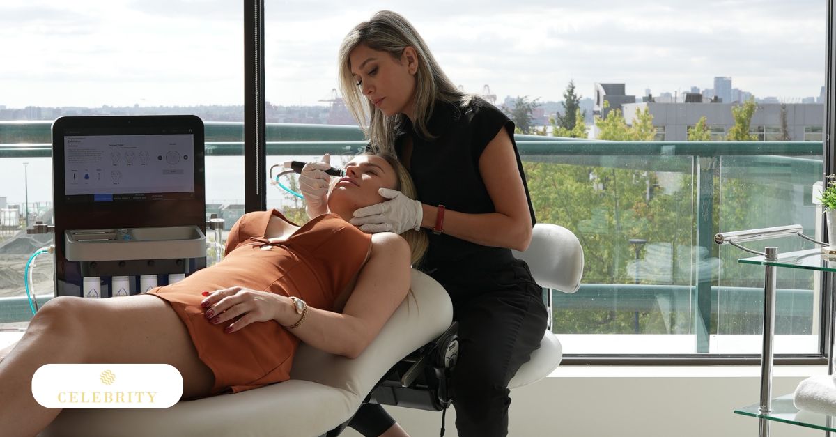 A technician using a specialized HydraFacial wand to cleanse and hydrate a client's facial skin.