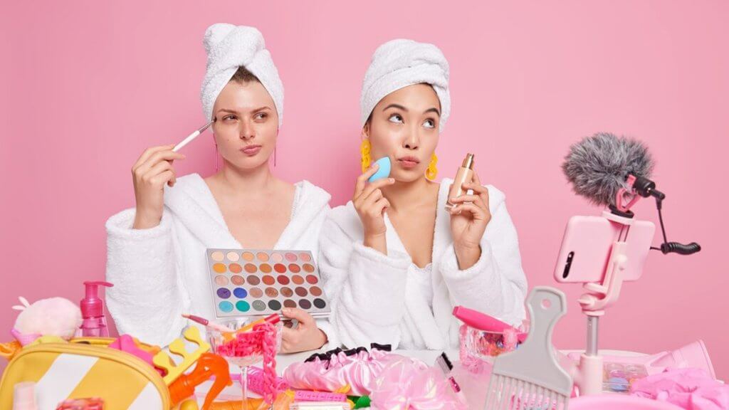 Women makeup by using cosmetic products