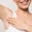 Smiling woman with clean underarms