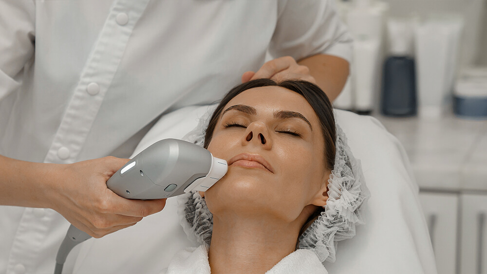 Professional cosmetologist is making cavitation with IPL