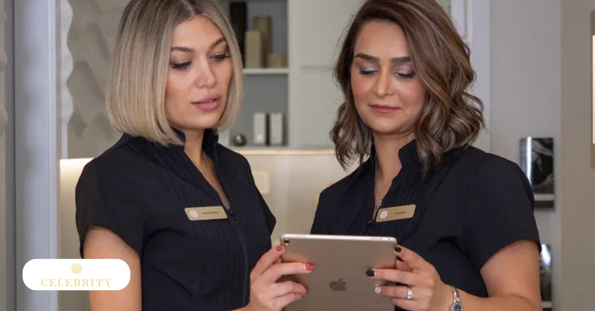 Two staff members at Celebrity Laser & Skin Care clinic wearing black uniforms 