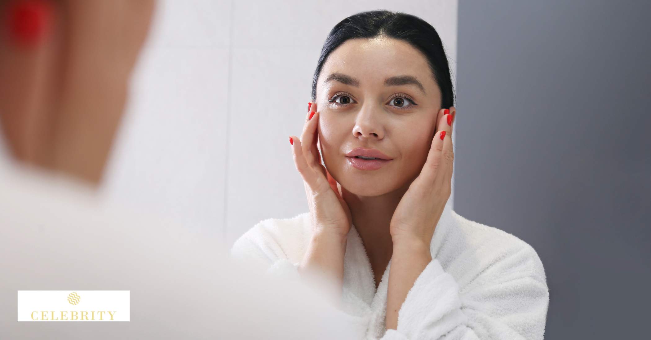 A woman applying skin care products on her face.