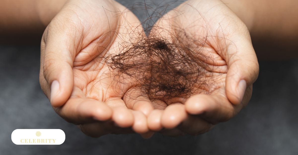 A pair of hands holds a significant amount of shed dark hair to visually demonstrate the distressing reality of why hair thinning or hair loss may be occurring.