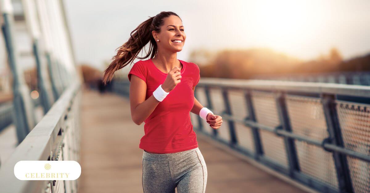 A fit woman jogs in a park on a sunny day, symbolizing an active lifestyle to support treatment outcomes