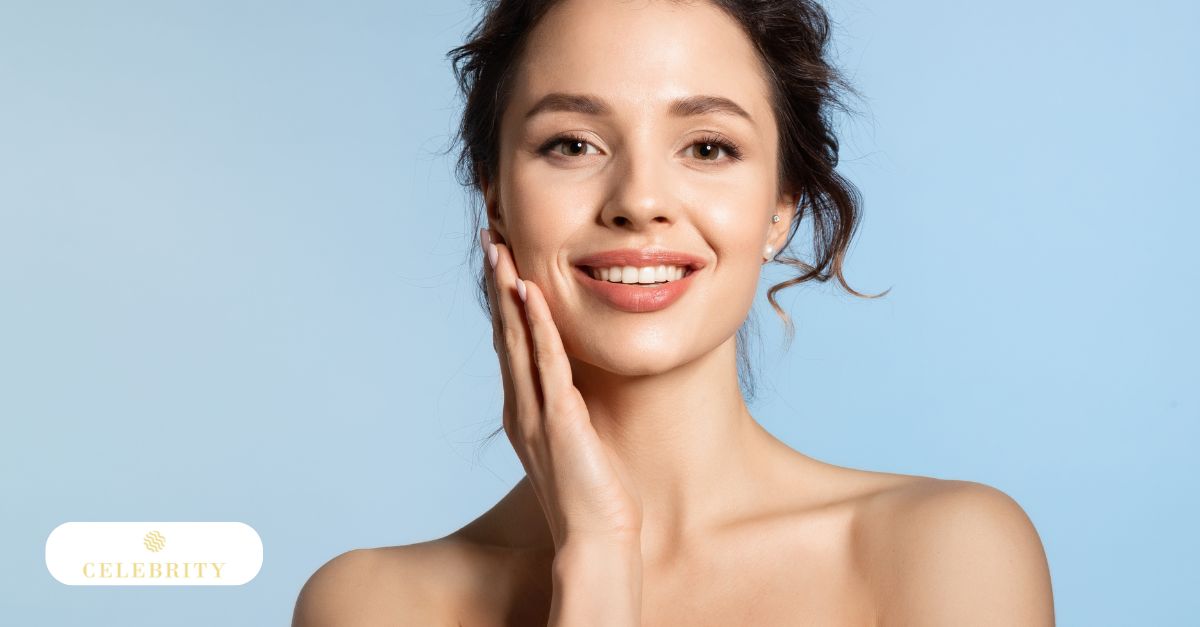 Woman with clear skin touching face, representing resveratrol benefits for anti-aging, radiance, and skin health.