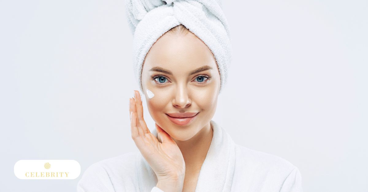 Woman applying skincare cream, illustrating resveratrol benefits for youthful, protected, radiant skin and antioxidant care.