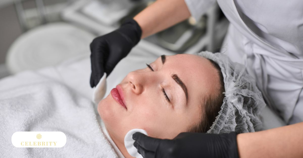 Skincare professional performing a deep-cleansing facial in a clinical spa setting.