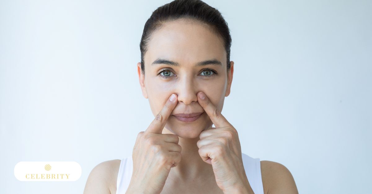 Close-up of a woman performing a face yoga technique