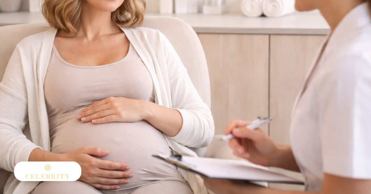 Pregnant woman seated in a consultation room speaking with a skincare professional, discussing HydraFacial safety during pregnancy.